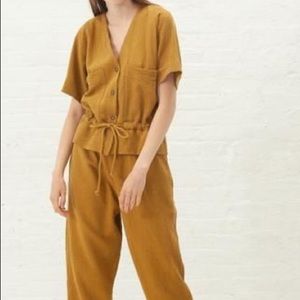 Black Crane sack jumpsuit in mustard